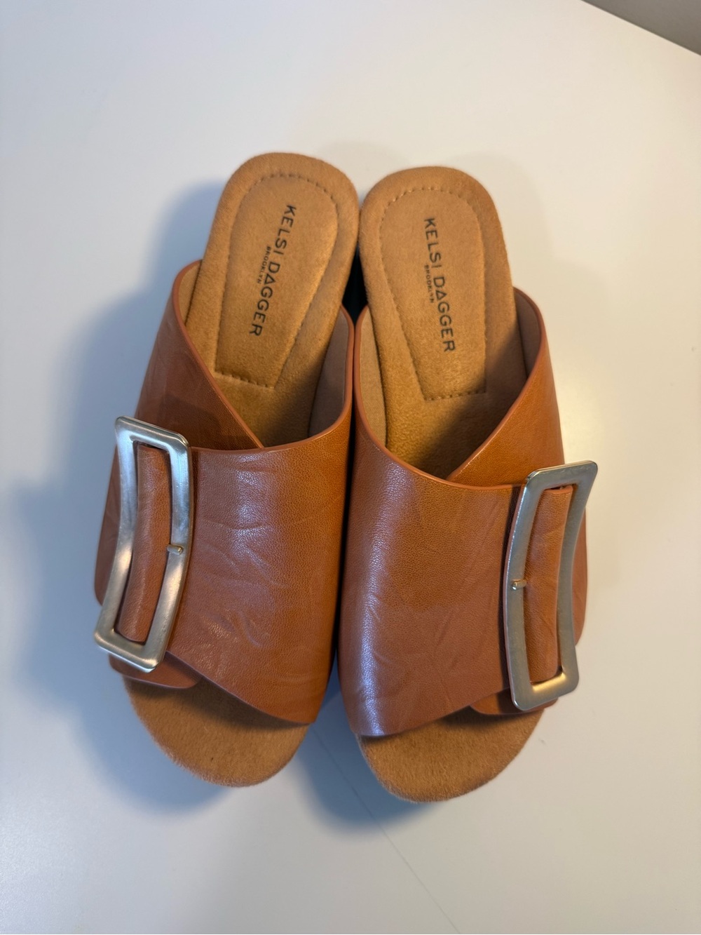 Kelsi Dagger Tan Leather Slide Mules with Silver Buckle
